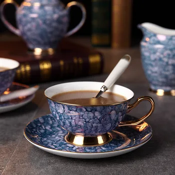 Европейският набор от кафе чаши и ястия от костен порцелан следобеден чай керамични вода